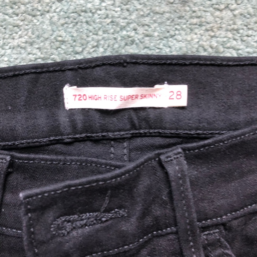 720 high rise black super skinny jeans size 28